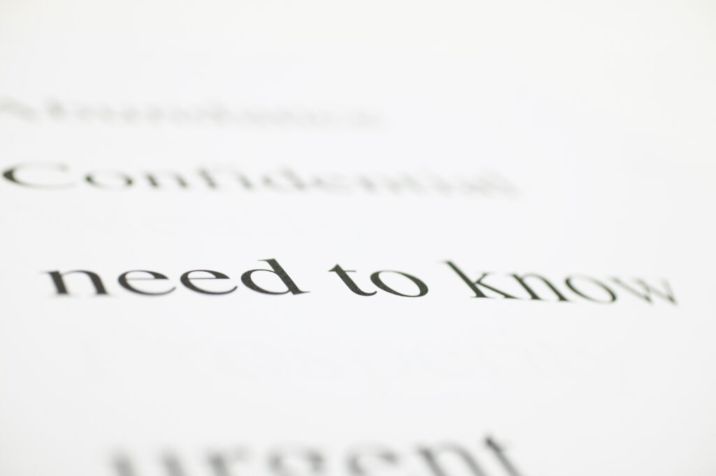 Stack of papers with writing